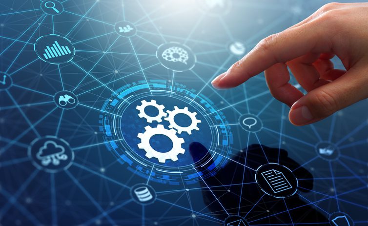 Hand touching digital gears on network interface.